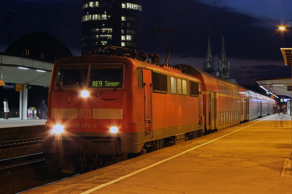 111 079-0 am RE9 in K�ln Messe/Deutz am 19.03.2012