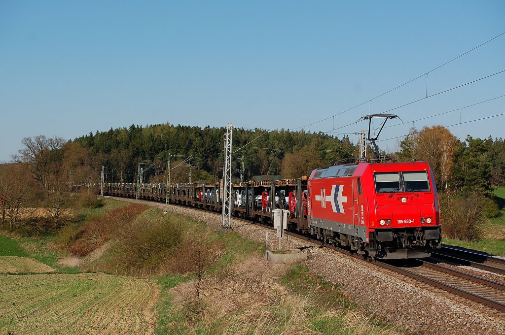185 630 der HGK ist mit ARS Wagen nach M�nchen Milbertshofen unterwegs.
Aufgenommen in Paindorf am 09.04.2011.