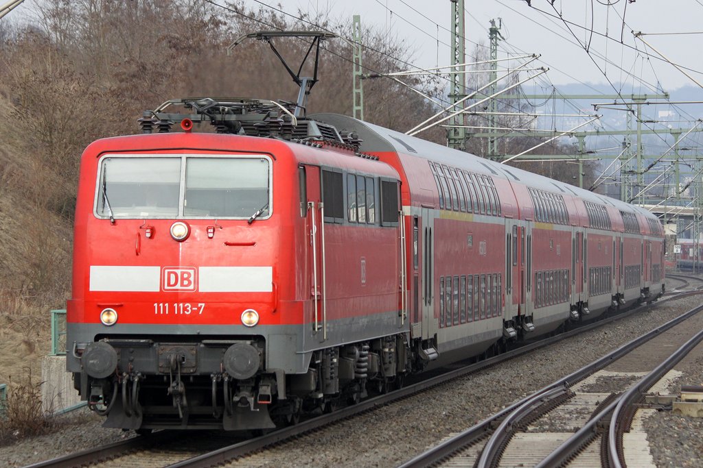 Die 111 113-7 als RE4 in Wuppertal Vohwinkel am 12,03,10 
