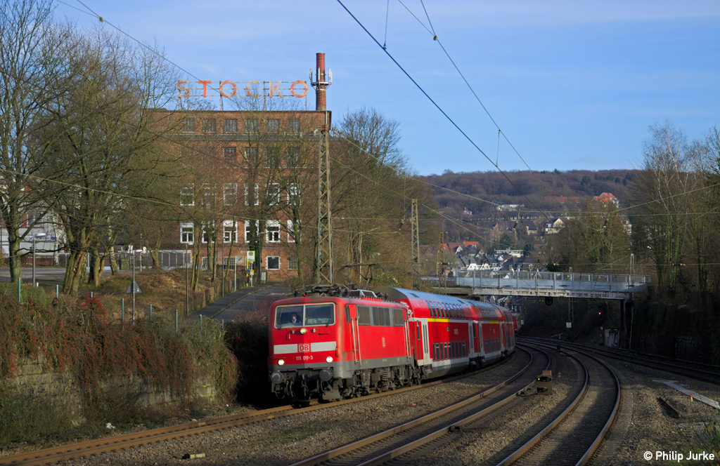111 011-3 mit dem RE 10420 (Dortmund - Aachen) am 30.12.2013 in Wuppertal-Sonnborn.
