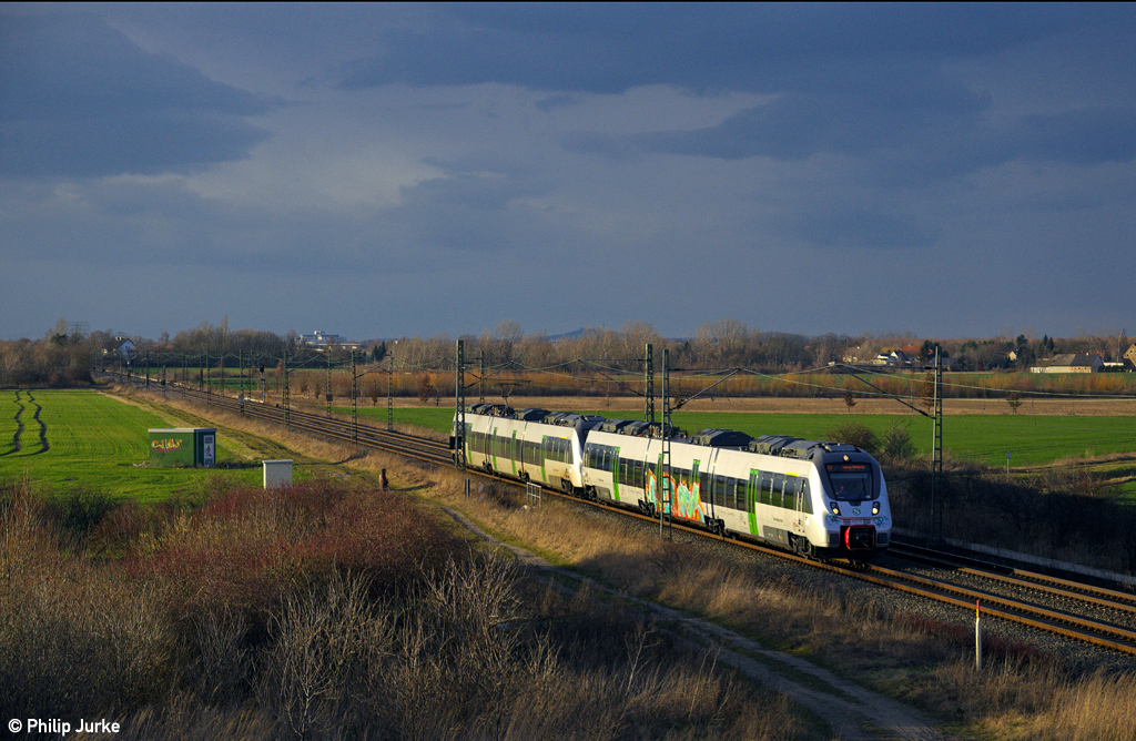 1442 112-7 + 1442 122-6 als S3 (Halle(Saale)Hbf - L.-Stötteritz) am 22.02.2014 in Schkeuditz West.
