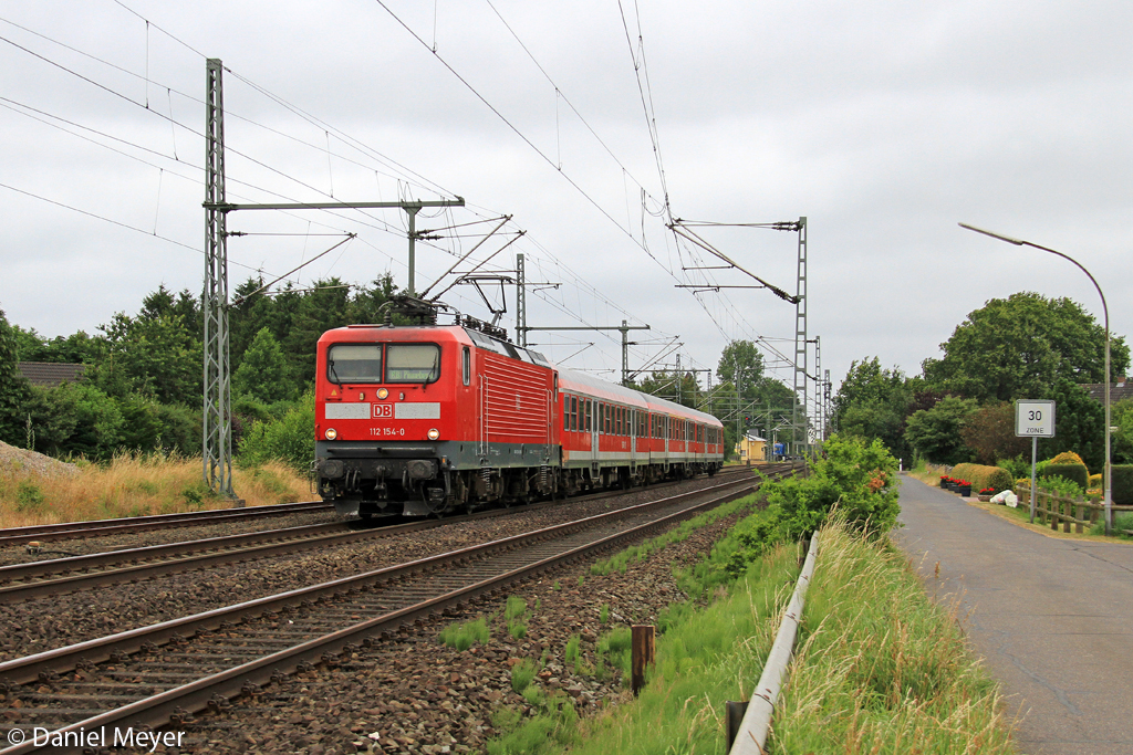 Die 112 154-0 in Brokstedt am 19.07.2013