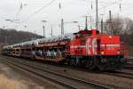DE76 der HGK mit einem langen Ford Autozug in K�ln West am 27.02.2012