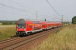 Der RE1 geschoben von 114 028 Richtung Berlin in Pillgram am 20,08,12