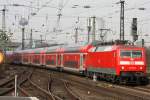 120 208-4 am 12.3.11 mit dem RE 9 nach Siegen bei der Einfahrt in K�ln messe/Deutz