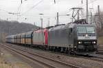 185 551-9 der MRCE/CFL Cargo mit CFL Cargo 4011 und PKP Cargo Wagen in K�ln West am 15.02.2011