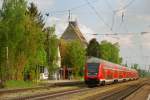 Der RE M�nchen-Treuchtlingen, aufgenommen bei der Durchfahrt durch Gersthofen, am 27.04.11.