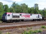 OHE RedTiger 330094 steht mit einen leeren Holzzug in Munster (14.06.10)